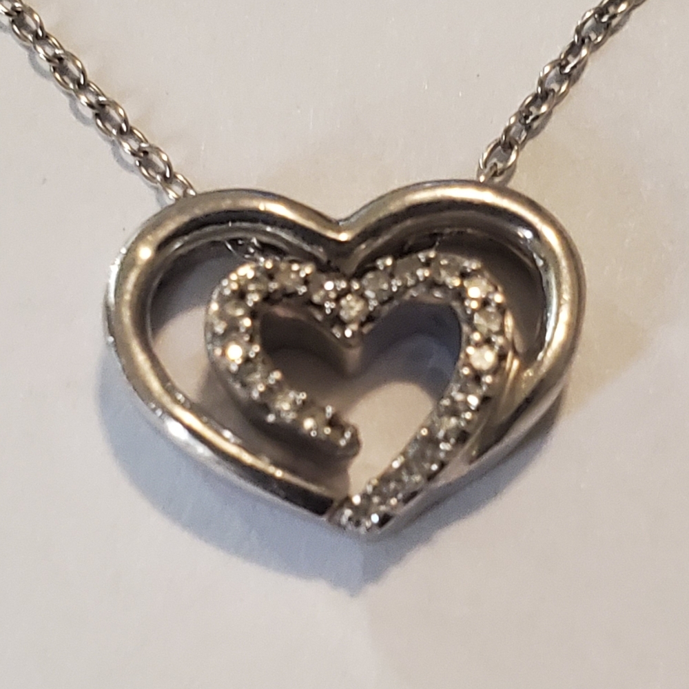 Sadye L. Vassil Diamond Double Heart Pendant.